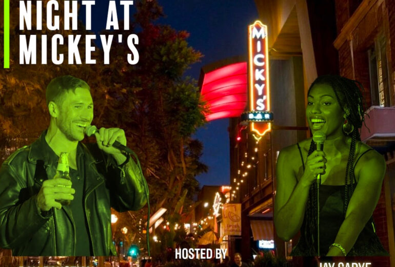 An eye-catching promotional image for 'Open Mic Night at Micky's' in West Hollywood. The photo showcases two performers on stage, Dan Paustian, a male comedian in a leather jacket holding a beer, and Jay Sarye, a female singer with vibrant green hair and a black top, each engaged in performance. The Micky's WeHo neon sign is vividly illuminated against the twilight city backdrop. Event occurs Tuesdays at 8 PM, with sign-ups at 7:30 PM.