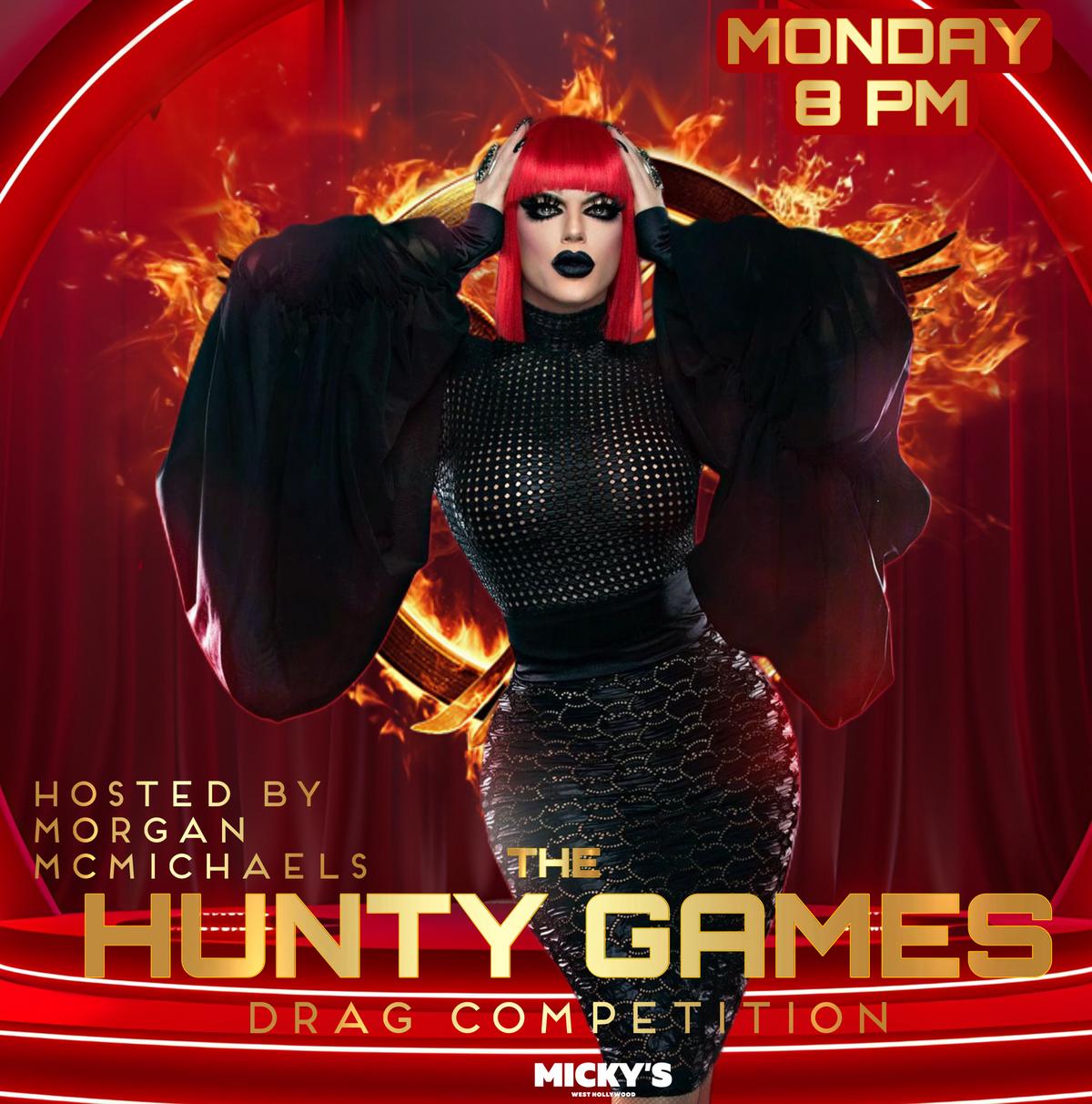 Promotional image for 'The Hunty Games' drag competition at Micky's West Hollywood, featuring host Morgan McMichaels in a dramatic red and black outfit against a fiery background. Event details state the event occurs Mondays at 8 PM.