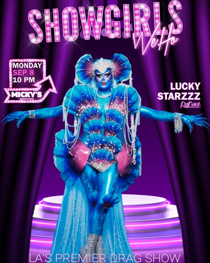 A promotional image for 'Showgirls WeHo' at Micky’s West Hollywood, featuring Lucky Starzzz in an extravagant blue and rhinestone-adorned drag costume on a purple stage curtain background. Event details state Monday, September 8th at 10 PM.