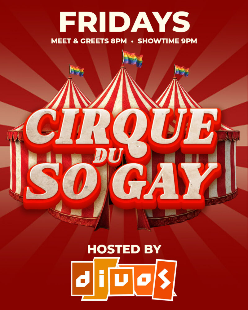 A bold, vibrant promotional poster with a red background and radiating light beams. At the top, large white text reads “FRIDAYS,” with smaller text underneath saying “MEET & GREETS 8PM • SHOWTIME 9PM.” Centered in the image are three red-and-white striped circus tents, each topped with a rainbow pride flag waving. Over the tents, large three-dimensional lettering in cream and red reads “CIRQUE DU SO GAY.” At the bottom, white text says “HOSTED BY,” followed by a stylized orange-and-white logo spelling "DIVOS"
